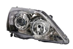 Reflektor świateł przednich TYC 20-11451-36-2