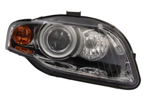 Reflektor świateł przednich TYC 20-11427-05-2